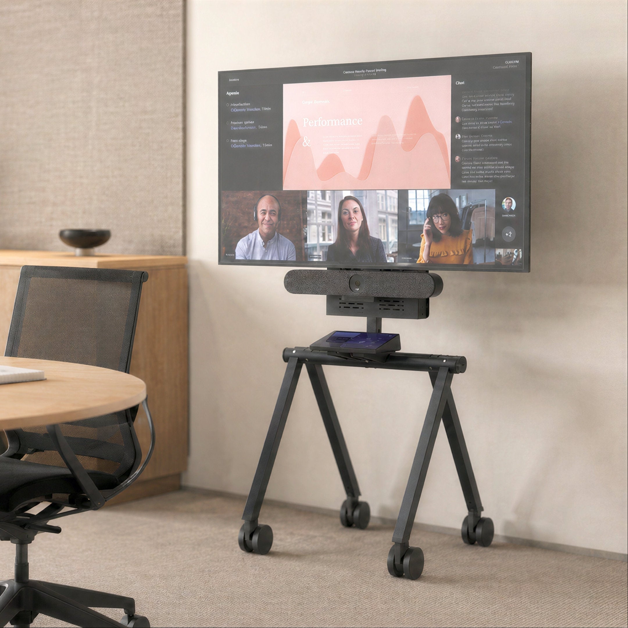 Heckler Express Install Rolling Stand with video conferencing display in a meeting room.
