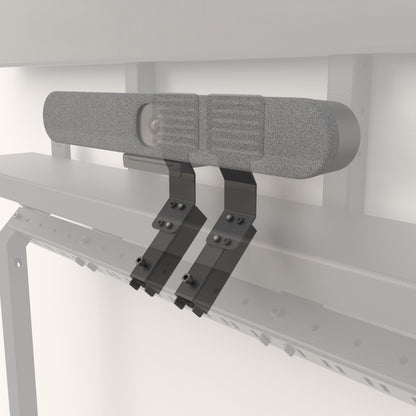 Camera mount brackets behind a fabric video bar.